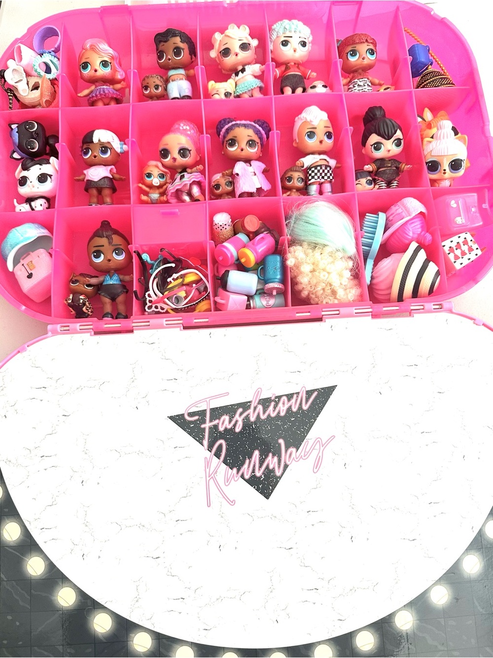 L.O.L. Surprise! Fashion Show On-the-Go Storage Case 
Dolls & Pets & Accessories